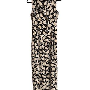 Michael Kors jumpsuit in black and white white with gold buttons so sharp